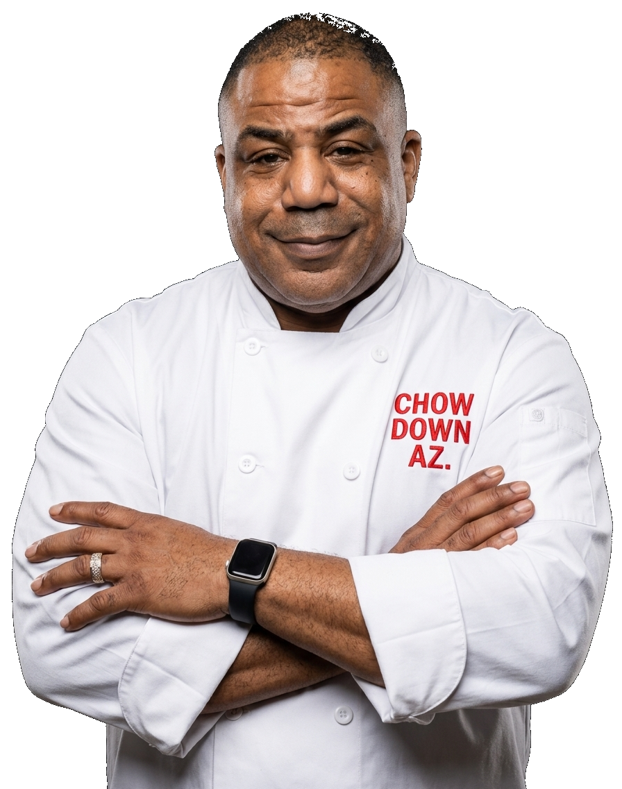 Chef Moe in a white chef outfit